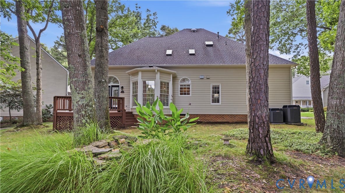 12400 Chadsworth Place, Wyndham, Glen Allen, VA 23059 Rear exterior featuring a multi-level wood deck, bay windows, and light beige siding