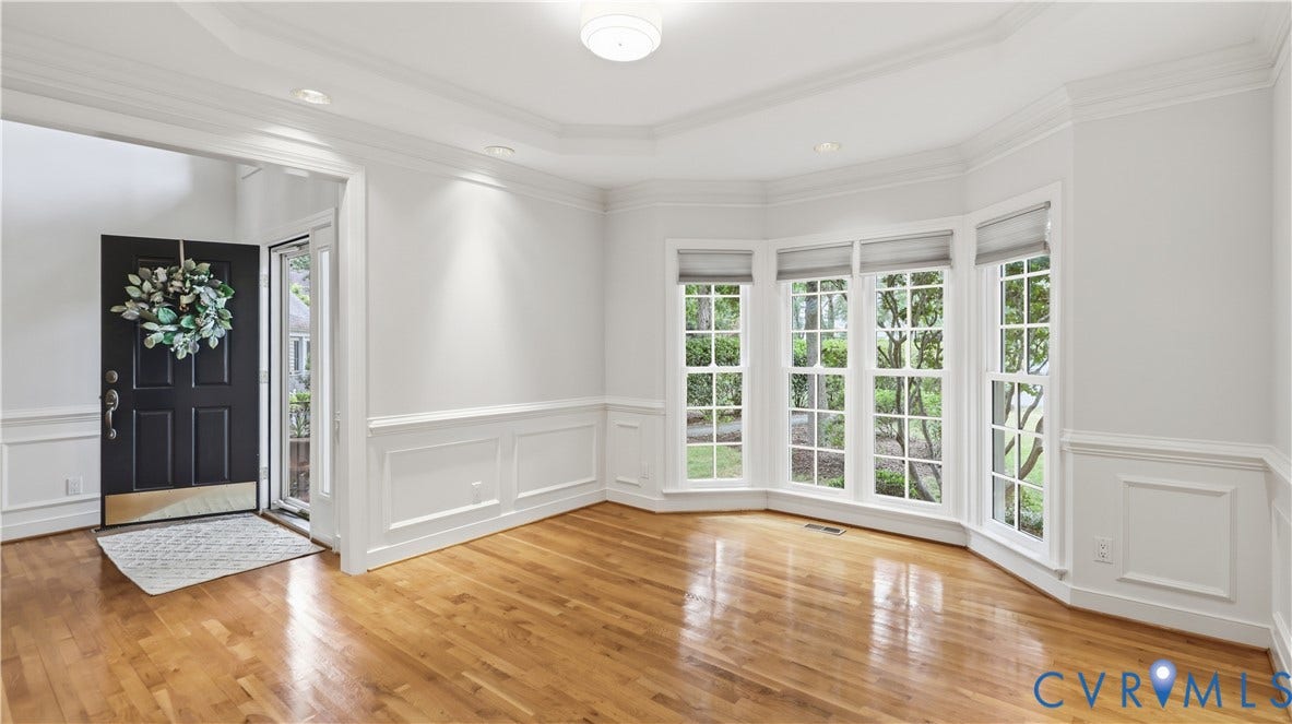 12400 Chadsworth Place, Wyndham, Glen Allen, VA 23059 Hardwood flooring throughout featuring bay windows with individual blinds, extensive wainscoting and crown molding, recessed lighting, and a tray ceiling