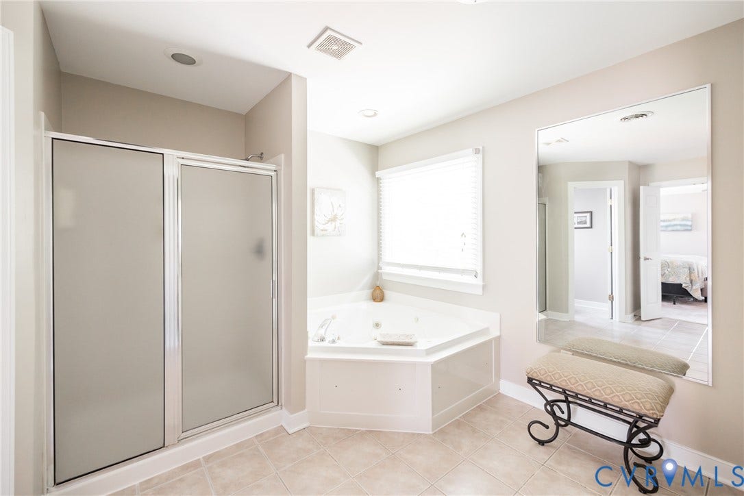 5541 Summer Creek Way, Millstone, Glen Allen, VA 23059 Primary bathroom has a separate tub and shower area, a water closet, a large double vanity and a large walk-in closet.