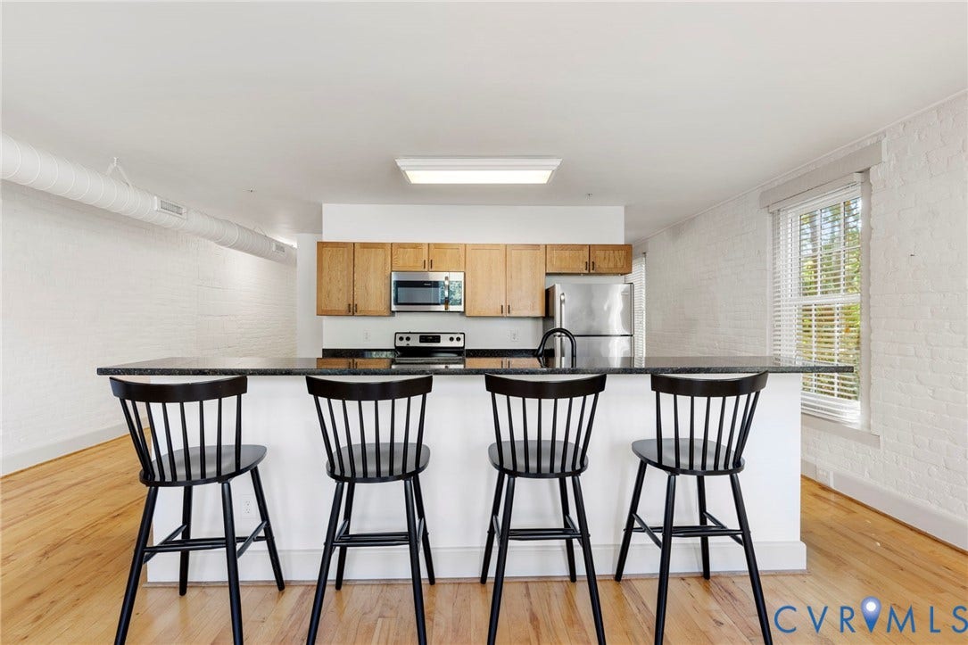 407 S Cherry Street, #U202, Oregon Hill, Richmond, VA 23220 Open kitchen with bar seaing.
