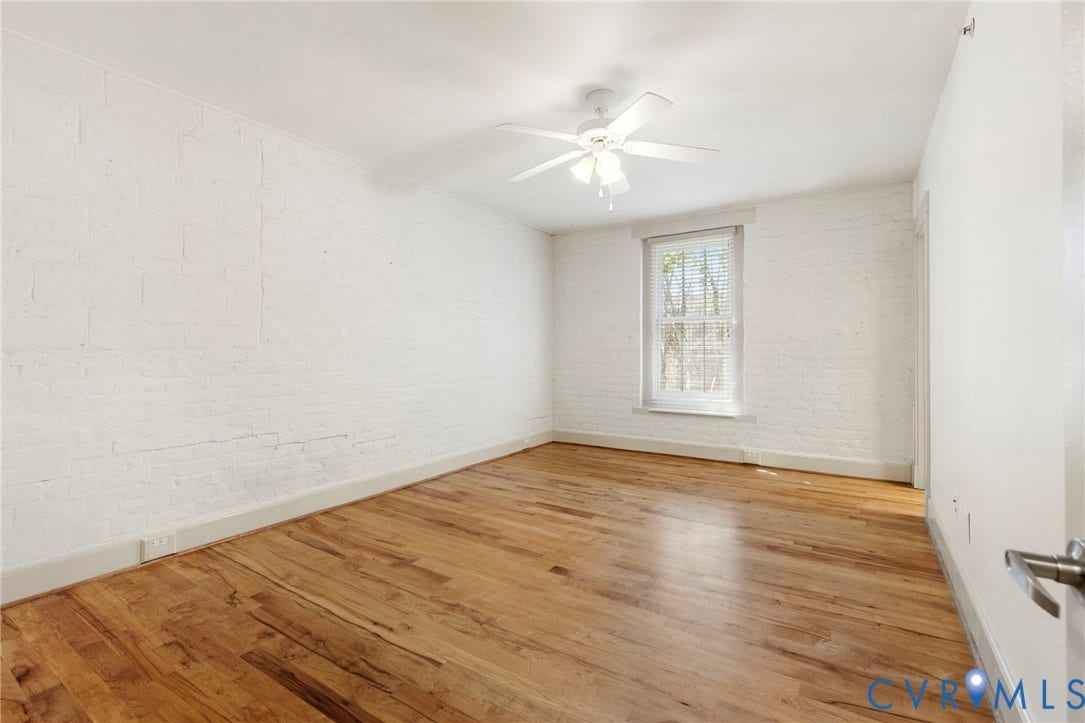 407 S Cherry Street, #U202, Oregon Hill, Richmond, VA 23220 Primary with ceiling fan and light, wood floor, en suite bathroom and walk in closet.