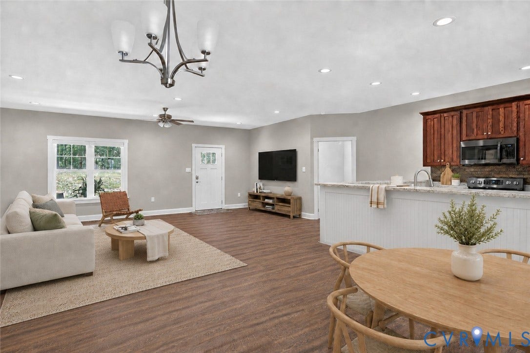 3834 Three Chopt Road, Nonw, Goochland, VA 23065 Open-concept living space featuring wood-finish flooring, recessed lighting, and a neutral color palette