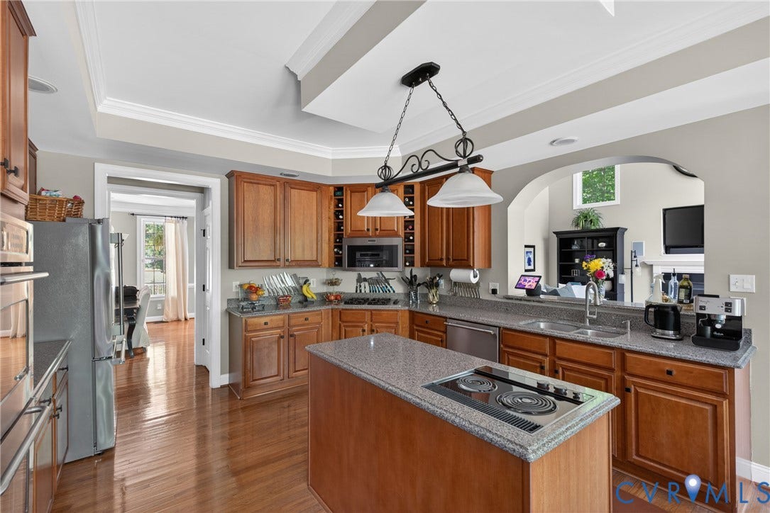 1830 Blackwood Drive, Maidens, VA 23102 cherry cabinets, gas and electric cooking, double oven