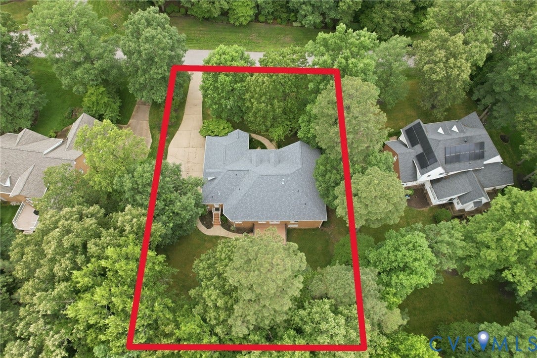OVER 1/2 acre lot with private rear yard