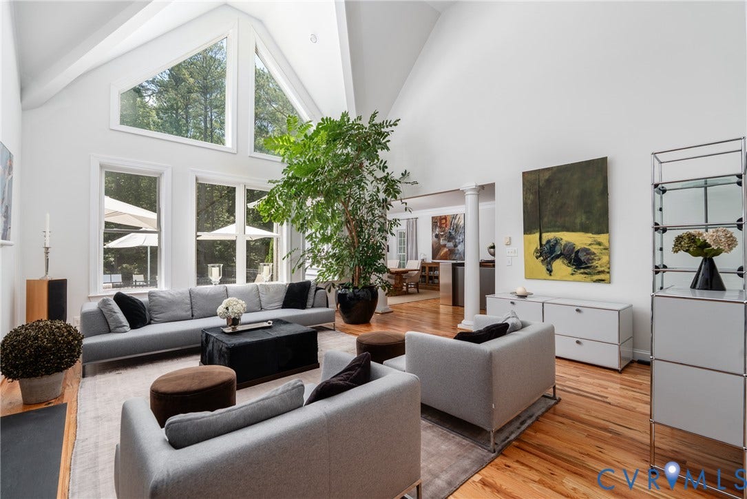 3124 Rock Cress Lane, Mill Forest, Sandy Hook, VA 23153 Comfortable seating floats within the spacious volume of a two-story Living Room.