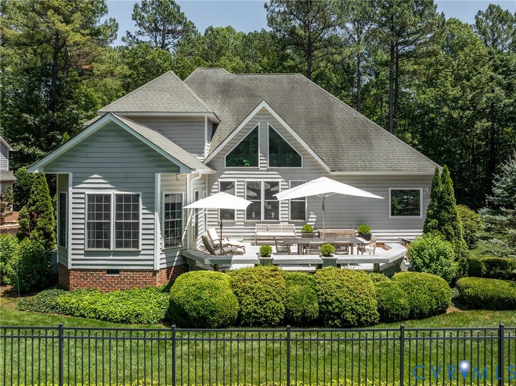 3124 Rock Cress Lane, Mill Forest, Sandy Hook, VA 23153 From the fenced Pool to rear of the House with appealing Deck and built in seating