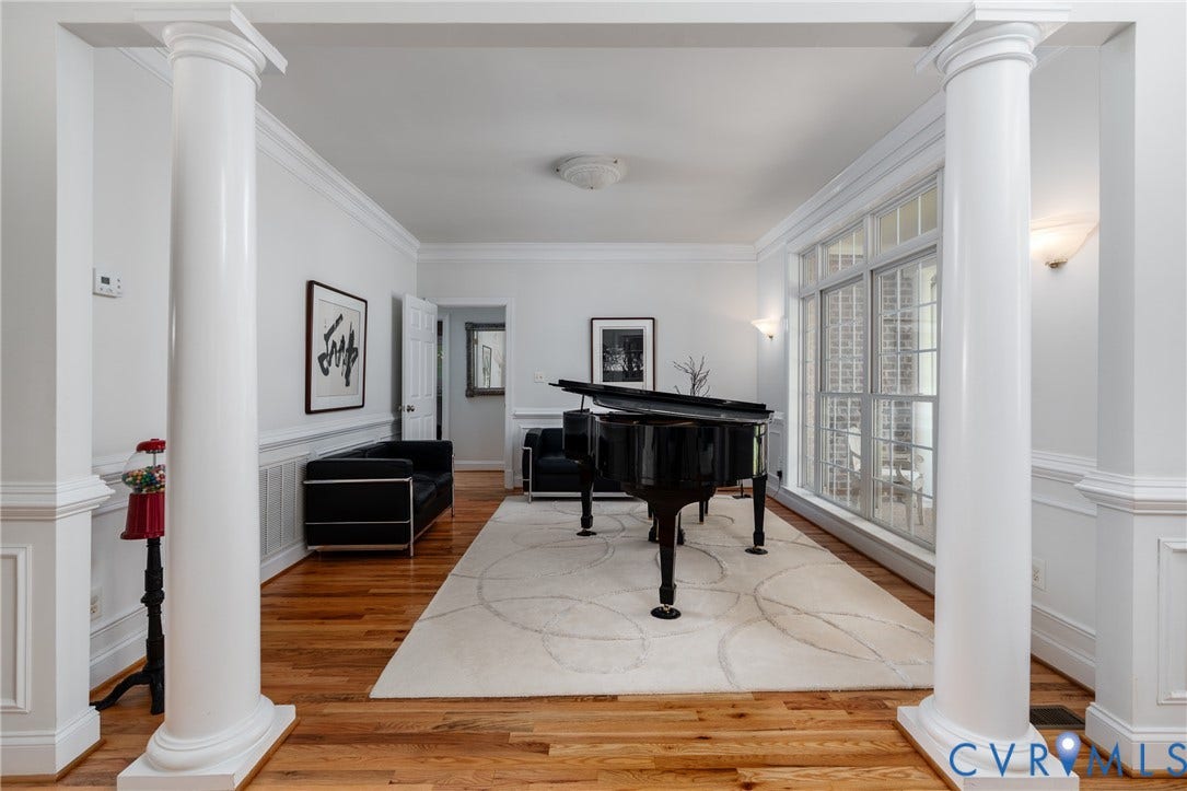 3124 Rock Cress Lane, Mill Forest, Sandy Hook, VA 23153 Graceful Doric columns in the Music Room create a visual separation from the Entry Hall without closing in the space.