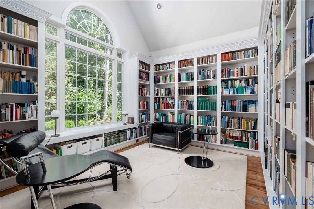 3124 Rock Cress Lane, Mill Forest, Sandy Hook, VA 23153 A welcoming retreat, the Library has three walls of floor to ceiling bookcases and a wide Palladian window with window seat.