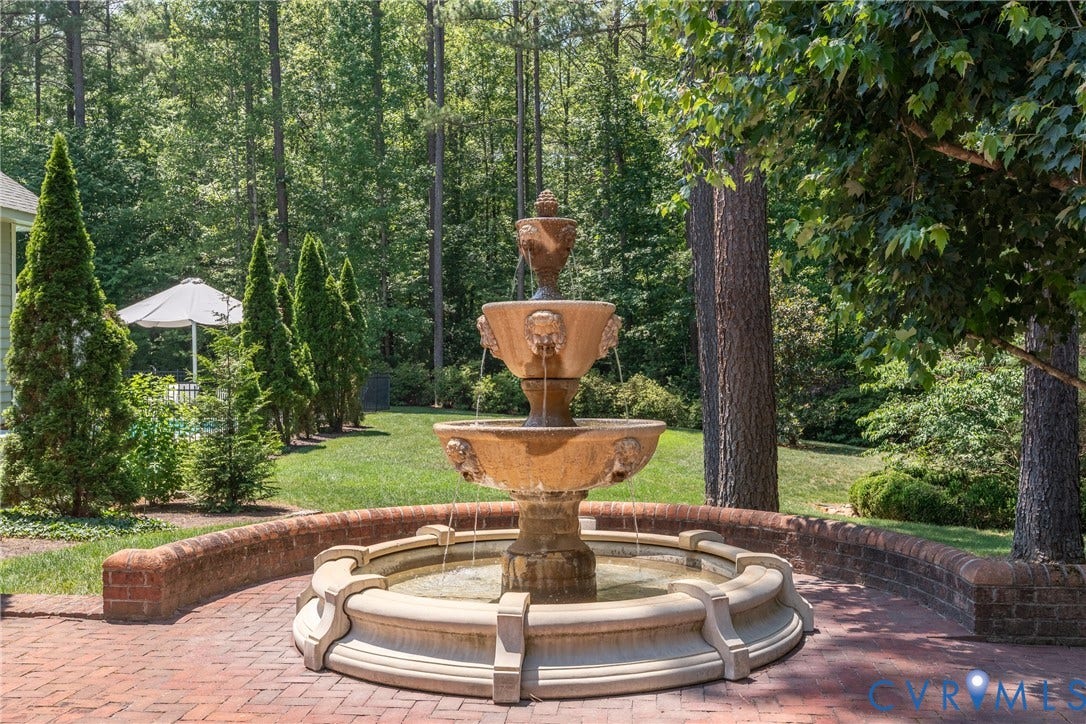 3124 Rock Cress Lane, Mill Forest, Sandy Hook, VA 23153 Distinguished by a three tier fountain, a brick Courtyard separates the Guest Cottage from the Main House