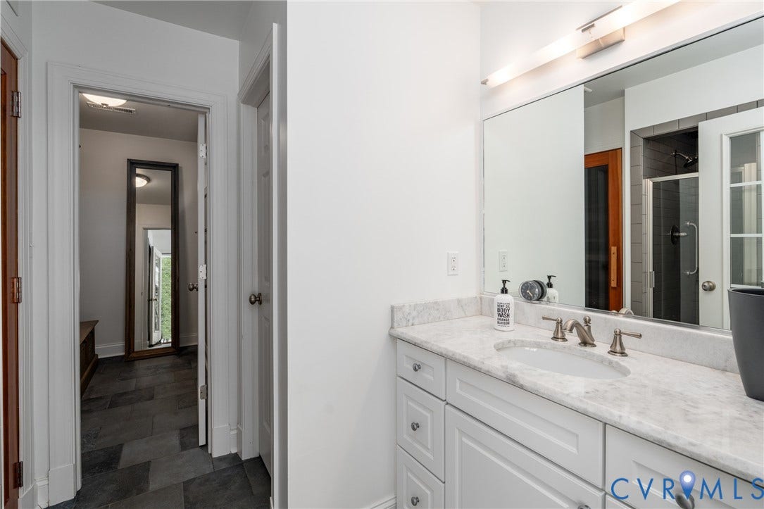 3124 Rock Cress Lane, Mill Forest, Sandy Hook, VA 23153 Quartz topped vanity with undermount sink in Pool House Bath/Dressing Room. Blue stone floors