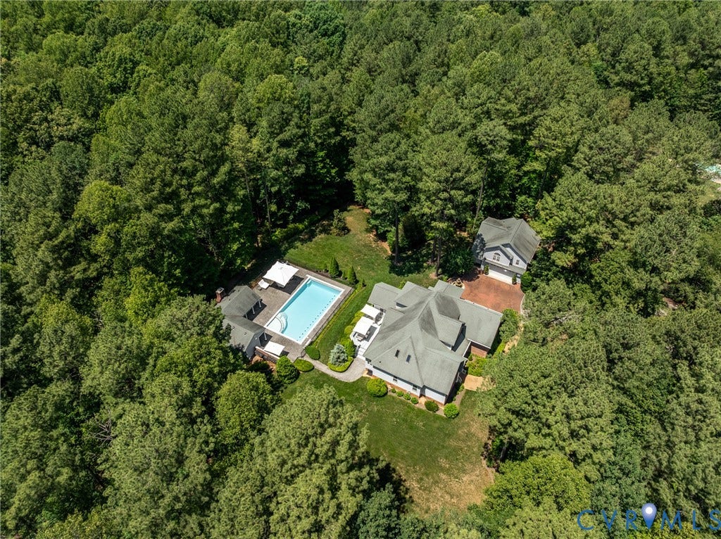 3124 Rock Cress Lane, Mill Forest, Sandy Hook, VA 23153 Aerial view of the 3124 Rock Cress complex, including the main house, Pool/Pool House plus the red brick fountain courtyard that creates a private entrance to a second two-car Garage with Half Bath, full Laundry, Storage and Exercise Room on first floor plus full Guest Suite on the second floor.