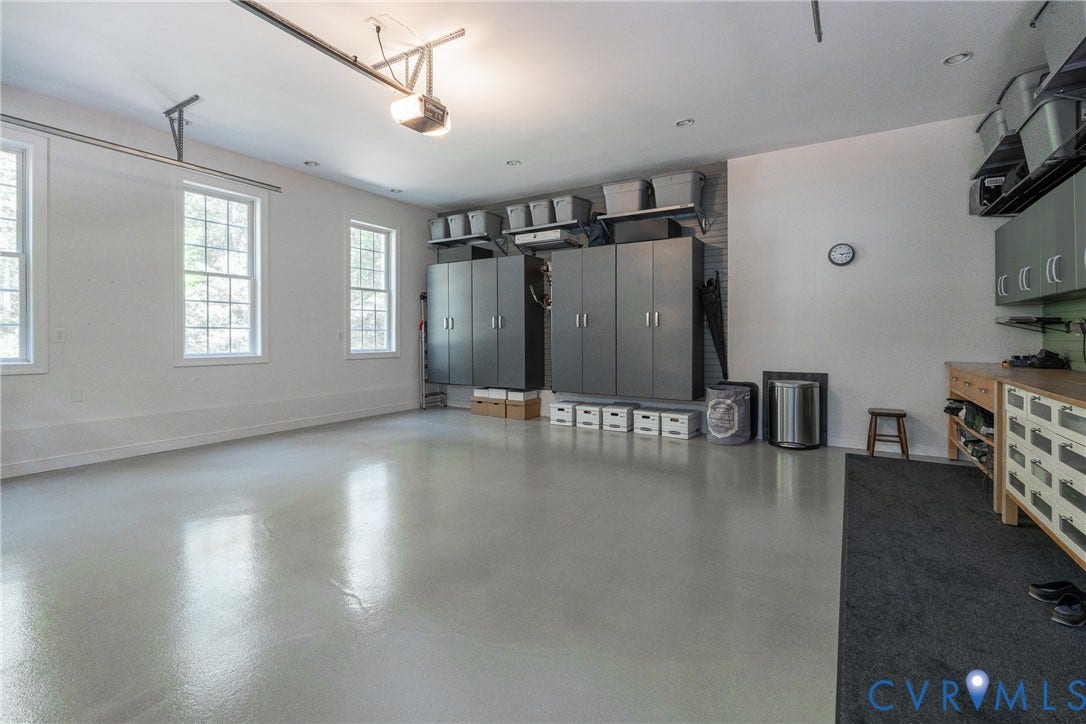 3124 Rock Cress Lane, Mill Forest, Sandy Hook, VA 23153 Oversized two-car Garage has massive storage, remote control door access and a sparkling epoxy floor.
