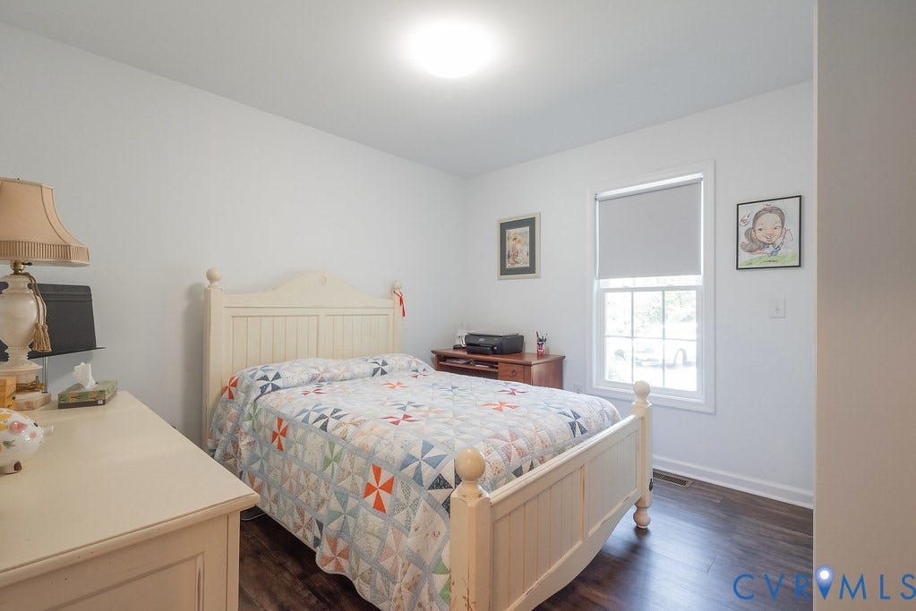 4336 Hells Bend Road, Quiet And Private, Palmyra, VA 22963 Bedroom featuring wood-finish flooring, white walls, and a single window with a roller shade