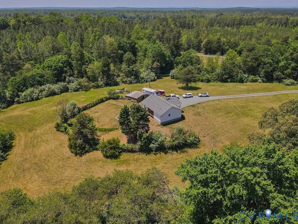 4336 Hells Bend Road, Quiet And Private, Palmyra, VA 22963 Expansive property featuring a white-sided residence with a gray roof, surrounded by mature trees and open grassy areas