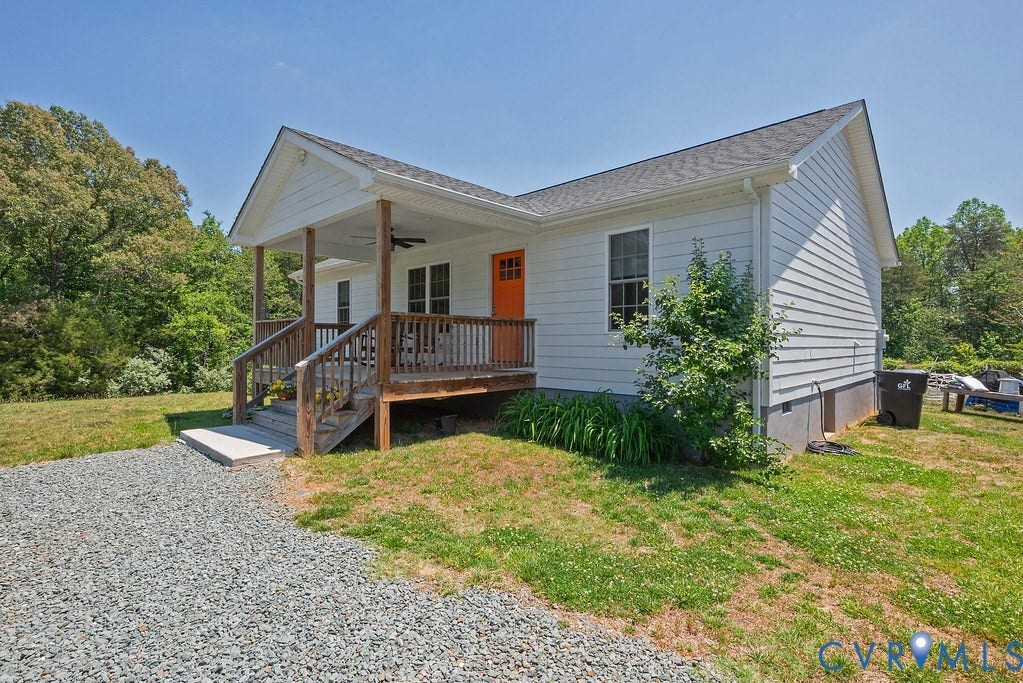 4336 Hells Bend Road, Quiet And Private, Palmyra, VA 22963 White siding exterior with a covered front porch featuring a wood deck and railings