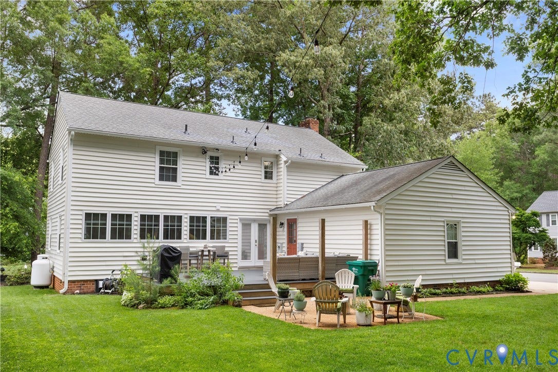 10100 Contessa Court, Glen Allen, VA 23060 Rear exterior featuring white horizontal siding and a gray shingle roof