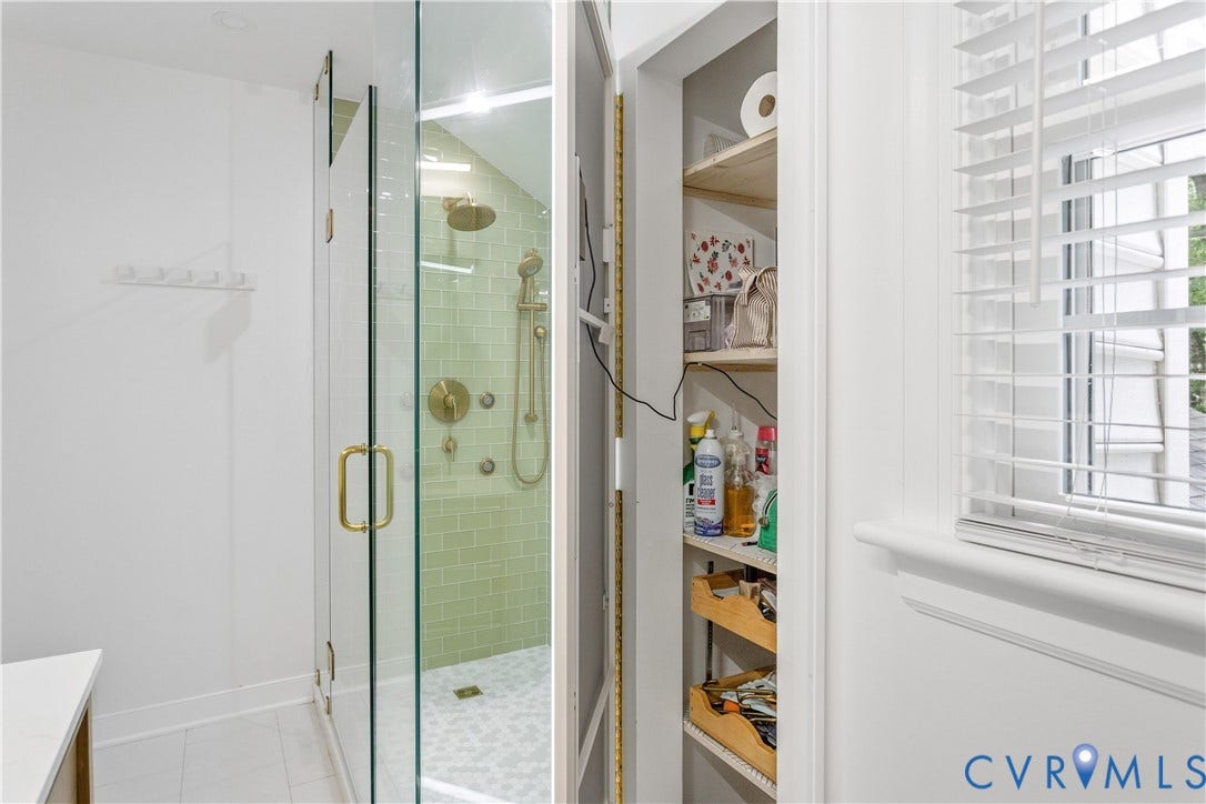 10100 Contessa Court, Glen Allen, VA 23060 Shower enclosure featuring clear glass panels and brass-finish hardware