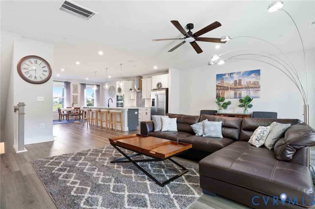 1121 N Lombardy Street, #B, Carver Square, Richmond, VA 23220 Family Room featuring Open-concept living space featuring wood-finish flooring, recessed lighting, a modern ceiling fan, and a kitchen island with pendant lighting