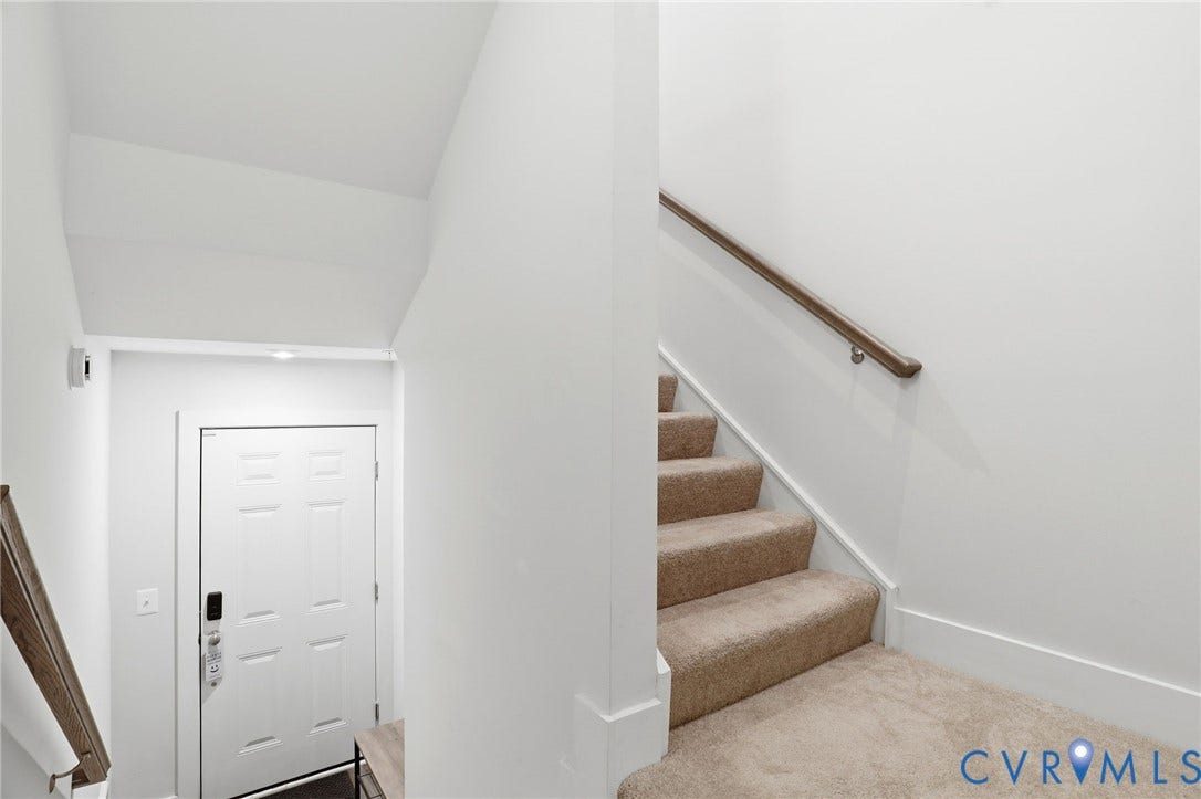 1121 N Lombardy Street, #B, Carver Square, Richmond, VA 23220 Foyer featuring a white paneled entry door with smart lock hardware and recessed lighting