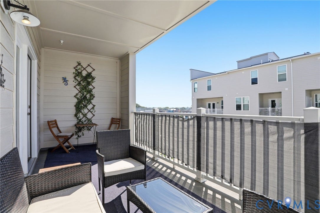 1121 N Lombardy Street, #B, Carver Square, Richmond, VA 23220 Covered balcony featuring siding exterior, a privacy screen, and a recessed ceiling
