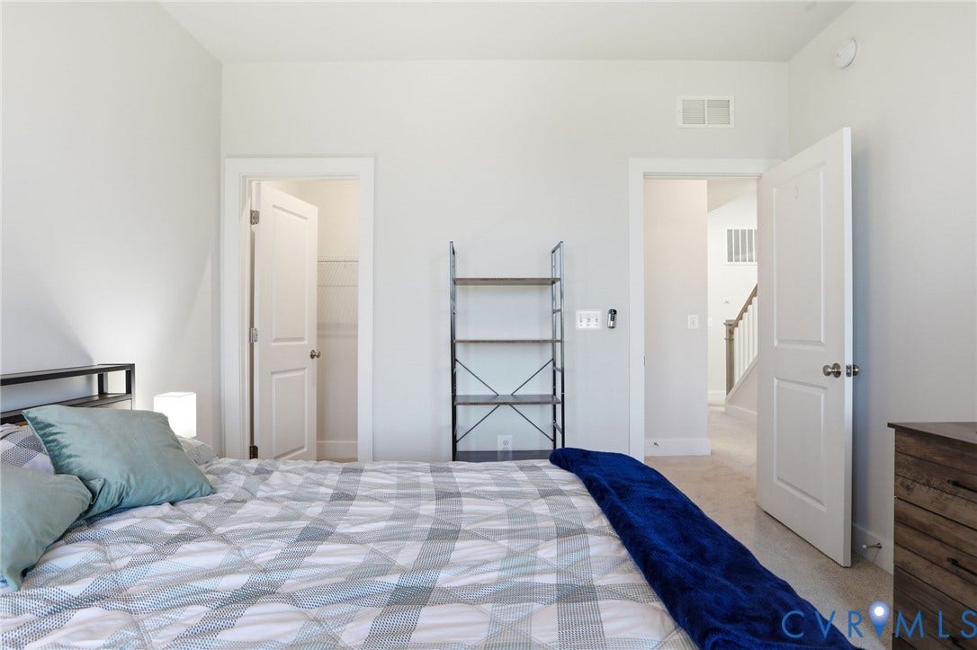 1121 N Lombardy Street, #B, Carver Square, Richmond, VA 23220 Bedroom with neutral wall paint, white trim, and light-toned carpet flooring