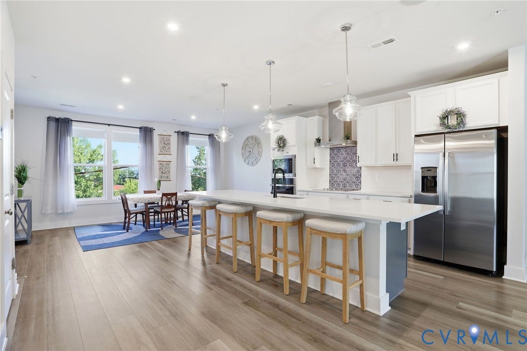 1121 N Lombardy Street, #B, Carver Square, Richmond, VA 23220 Open-concept kitchen and dining area featuring light wood-finish flooring