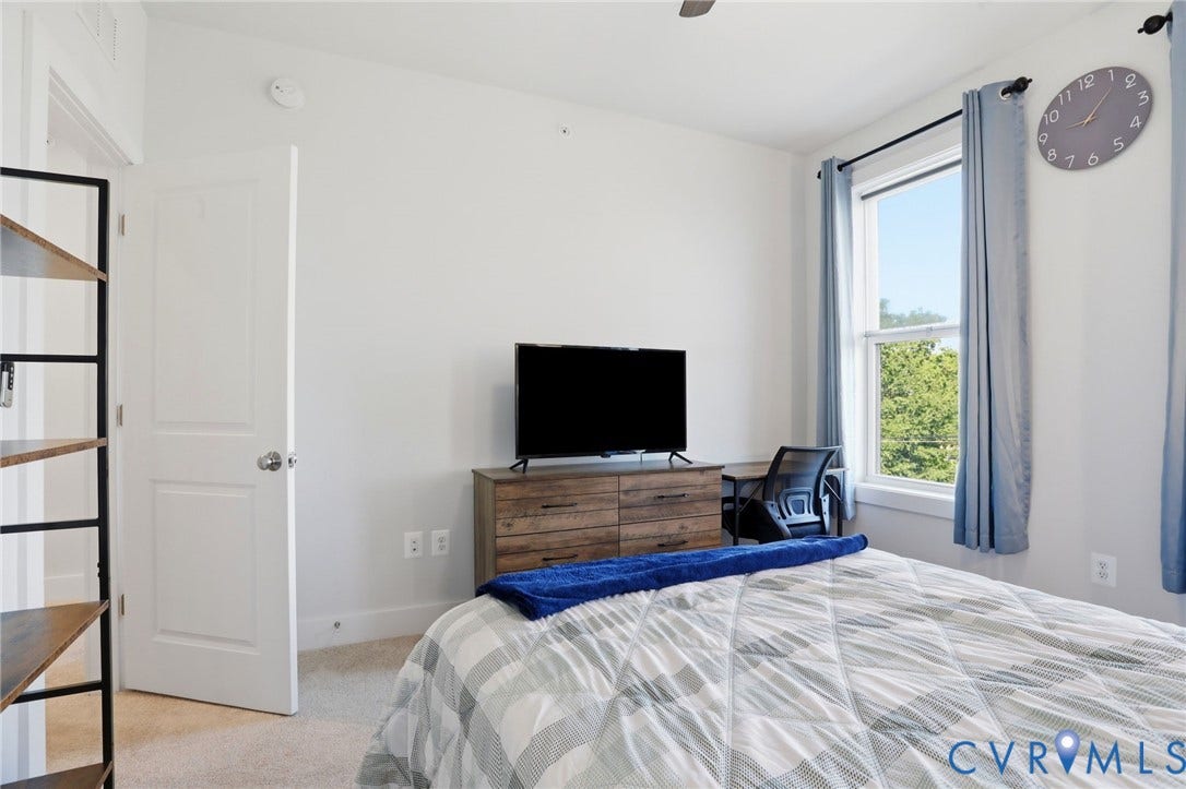 1121 N Lombardy Street, #B, Carver Square, Richmond, VA 23220 Bedroom featuring carpeting, a multi-pane window, and a white interior door