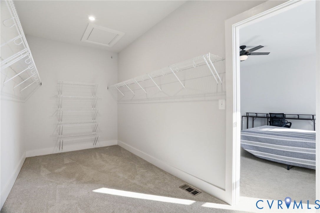 1121 N Lombardy Street, #B, Carver Square, Richmond, VA 23220 Well-appointed Walk-In closet in Primary Suite featuring white wire shelving