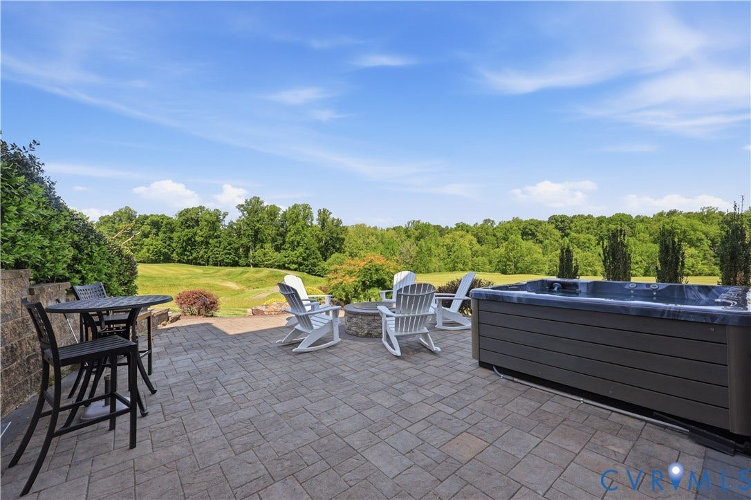 14849 Elliot Ridge Way, Glen Allen, VA 23059 Patio outside Basement with hot tub and fire pit.