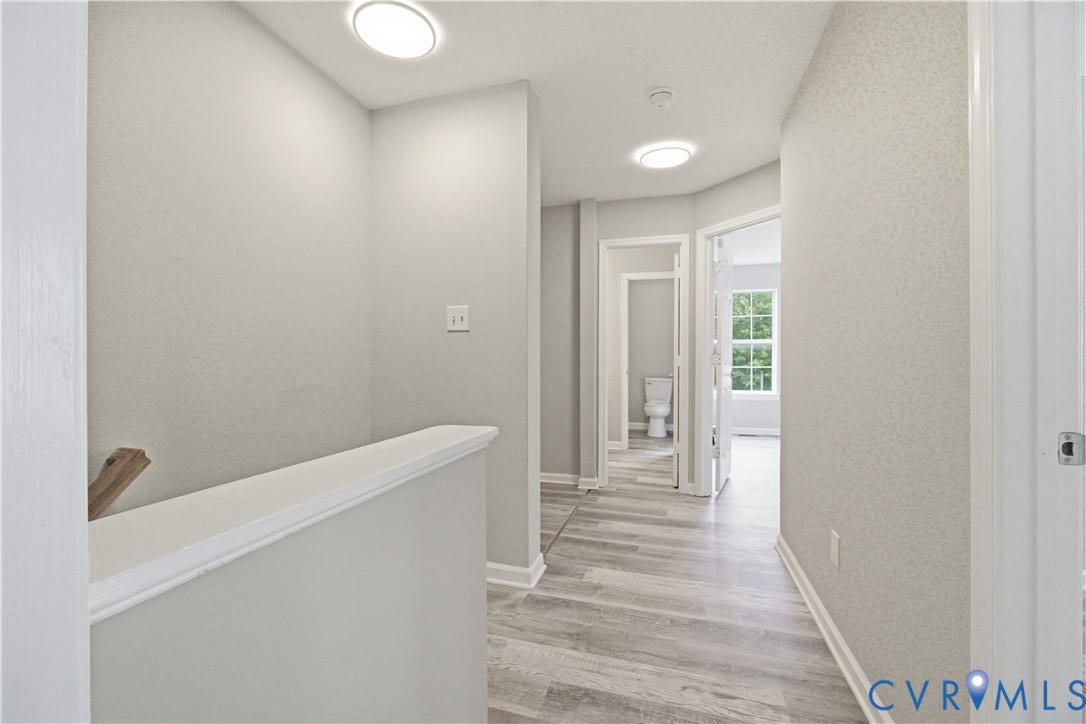 1304 Idlewood Avenue, Randolph, Richmond, VA 23220 Upper-level hallway featuring wood-finish flooring, recessed lighting, and light-toned wall finishes