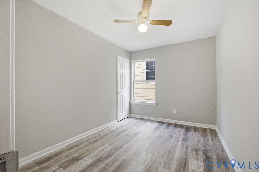 1304 Idlewood Avenue, Randolph, Richmond, VA 23220 Room featuring wood-finish flooring, light gray walls, white trim, and a ceiling fan with integrated lighting