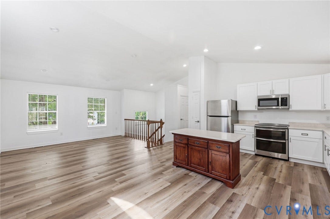 4217 Lipes Court, Glen Allen, VA 23223 Open-concept living space featuring wood-finish flooring and recessed lighting throughout