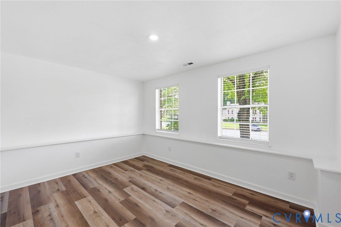 4217 Lipes Court, Glen Allen, VA 23223 Bright room featuring wood-finish flooring and white walls