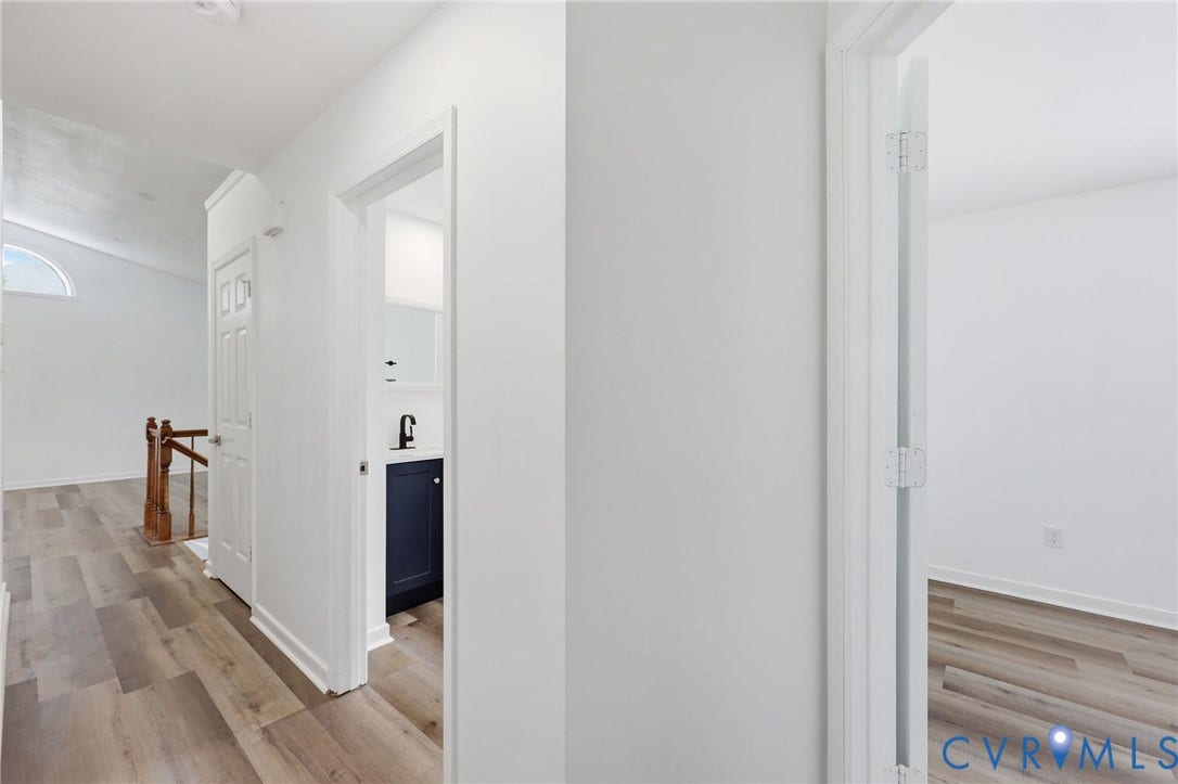 4217 Lipes Court, Glen Allen, VA 23223 Hallway featuring light wood-finish flooring and white walls