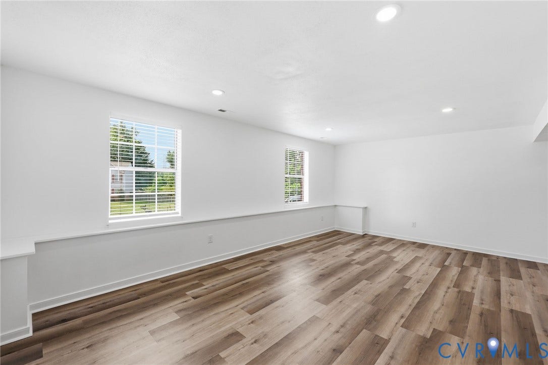 4217 Lipes Court, Glen Allen, VA 23223 Spacious room featuring wood-finish flooring, recessed lighting, and white trim