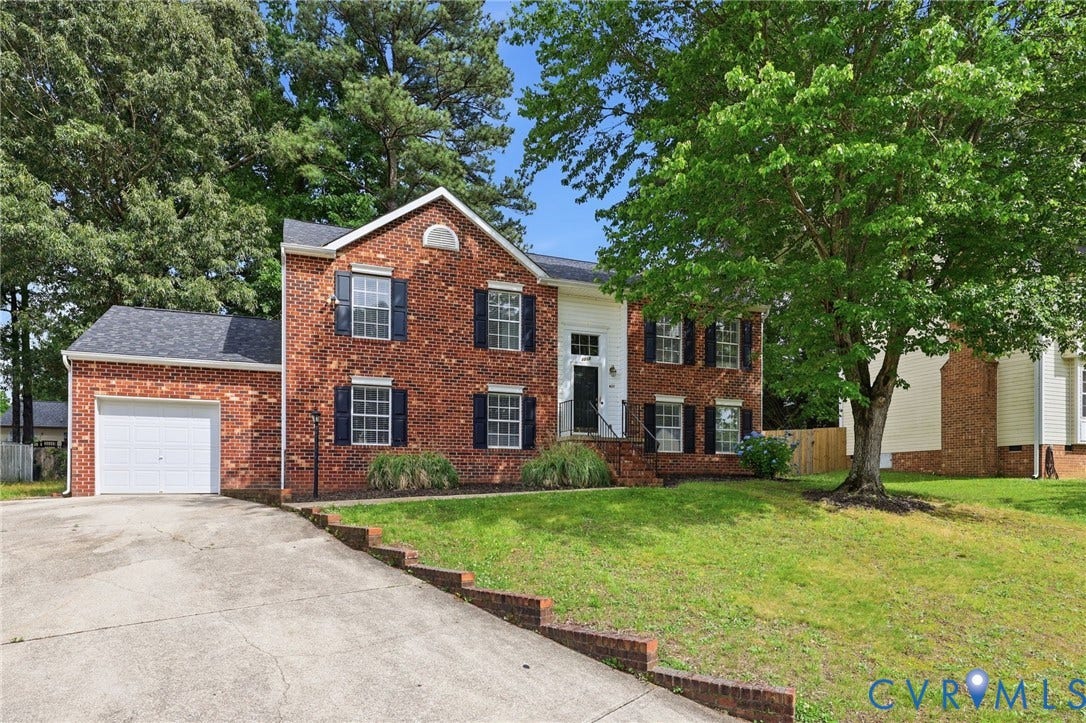 4217 Lipes Court, Glen Allen, VA 23223 Brick exterior residence with a two-story design and a prominent front entrance