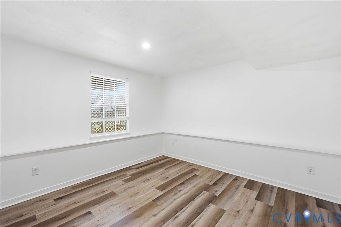 4217 Lipes Court, Glen Allen, VA 23223 Room featuring wood-finish flooring, white walls, and a window with blinds