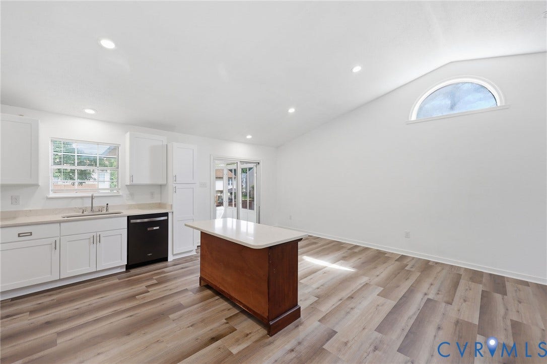 4217 Lipes Court, Glen Allen, VA 23223 Open-concept living space with wood-finish flooring, a vaulted ceiling, and recessed lighting