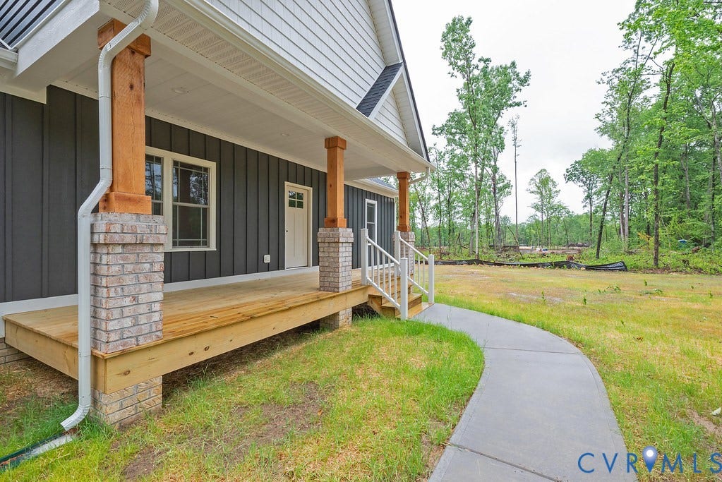 1220 Jefferson Highway, Moseley Estates, Louisa, VA 23093 Front porch with wood-finish decking and brick-base columns