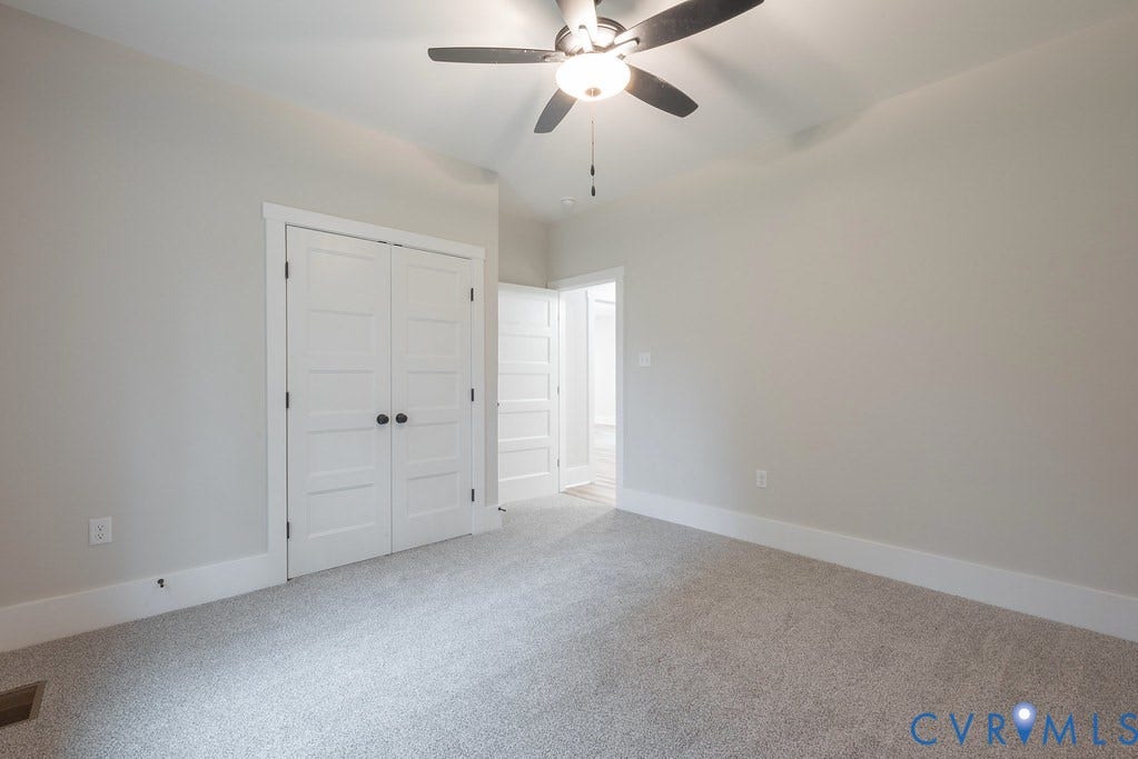 1220 Jefferson Highway, Moseley Estates, Louisa, VA 23093 Neutral-toned walls complement plush grey carpeting