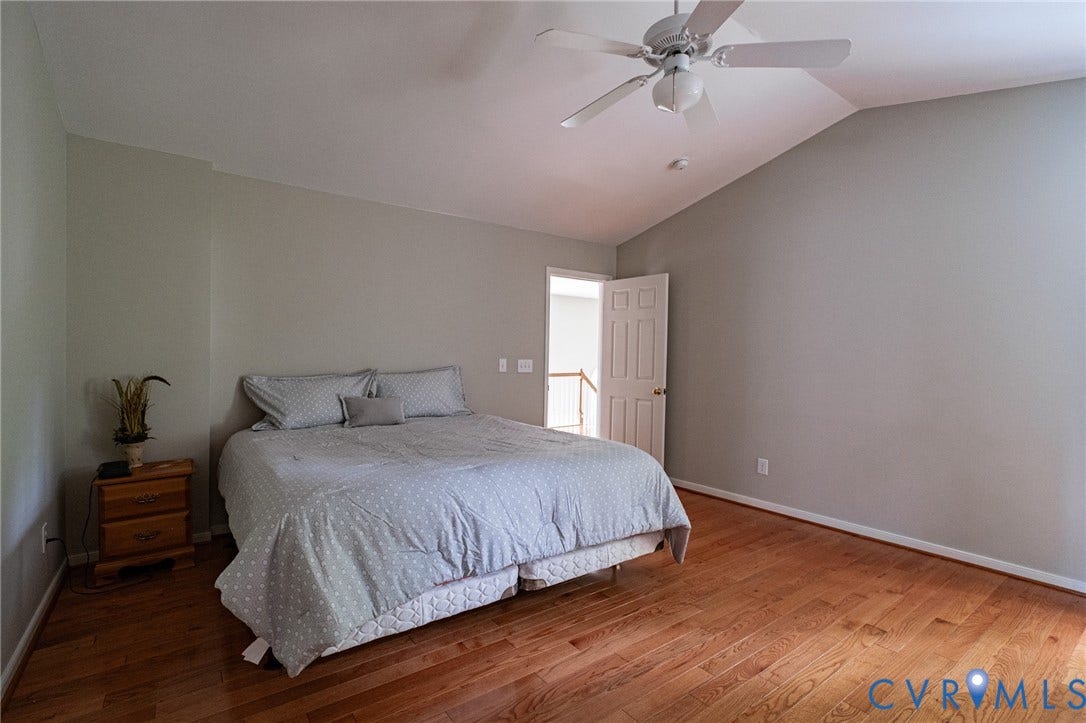 10517 Park Tree Place, Mountain Glen/ Glen Allen, Glen Allen, VA 23060 Bedroom featuring vaulted ceilings, wood-finish flooring, and a ceiling fan