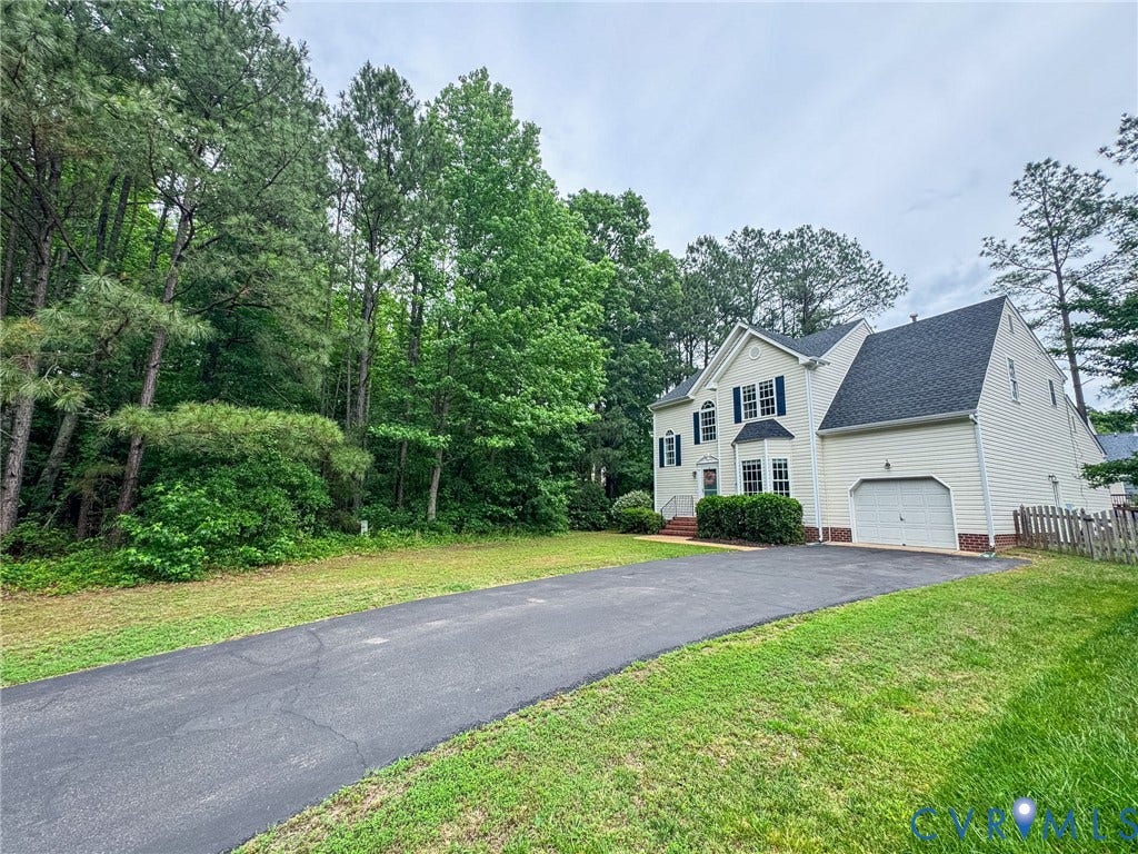 10517 Park Tree Place, Mountain Glen/ Glen Allen, Glen Allen, VA 23060 Two-story property featuring light-colored siding, a dark shingle roof, and a prominent front-facing garage