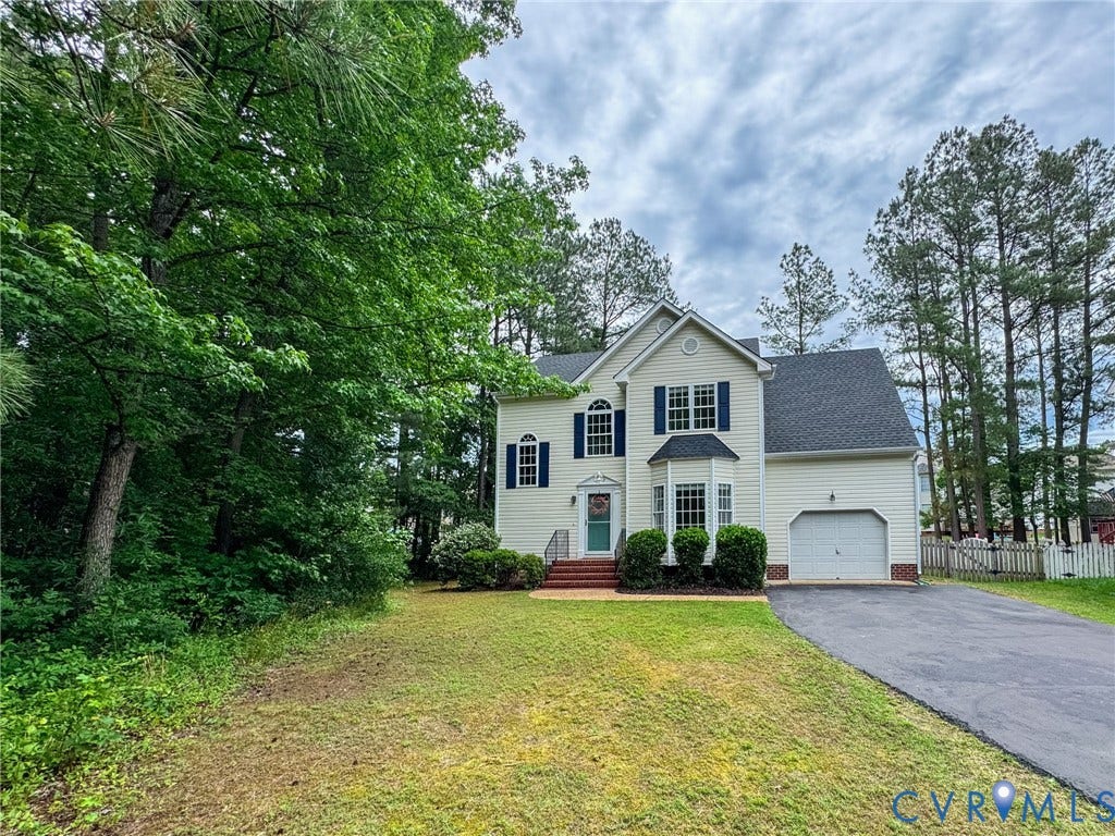 10517 Park Tree Place, Mountain Glen/ Glen Allen, Glen Allen, VA 23060 Two-story exterior featuring light-colored siding, a dark shingled roof, and a prominent bay window