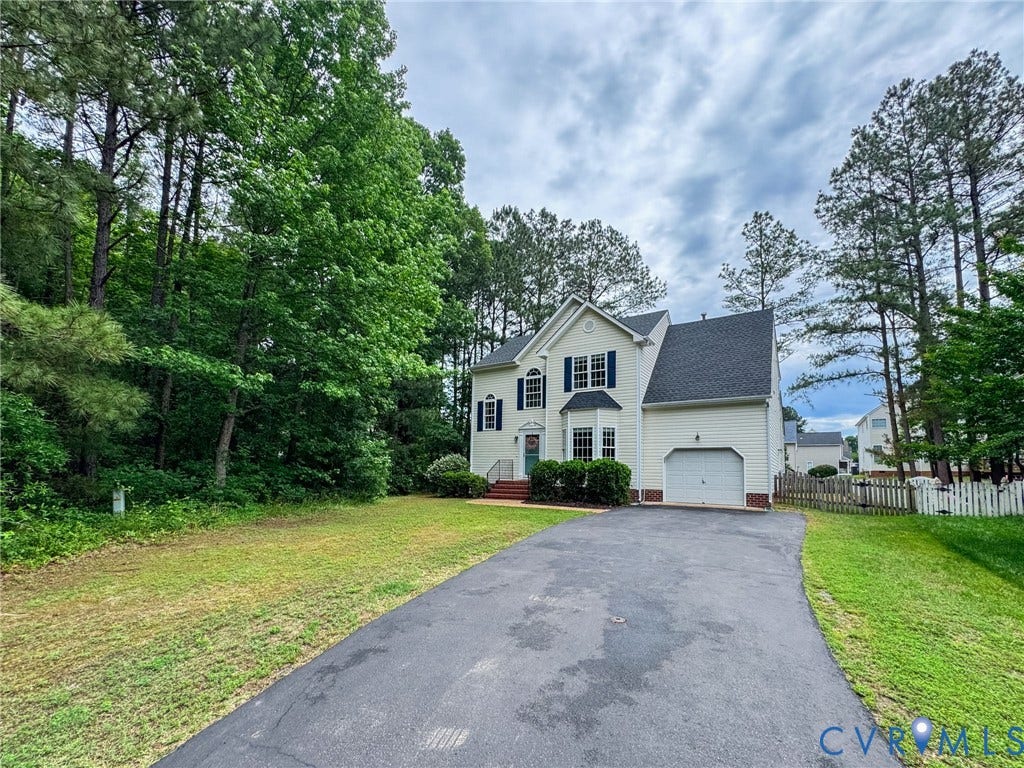 10517 Park Tree Place, Mountain Glen/ Glen Allen, Glen Allen, VA 23060 Two-story property with light-colored siding, a dark shingled roof, and a prominent front-facing garage