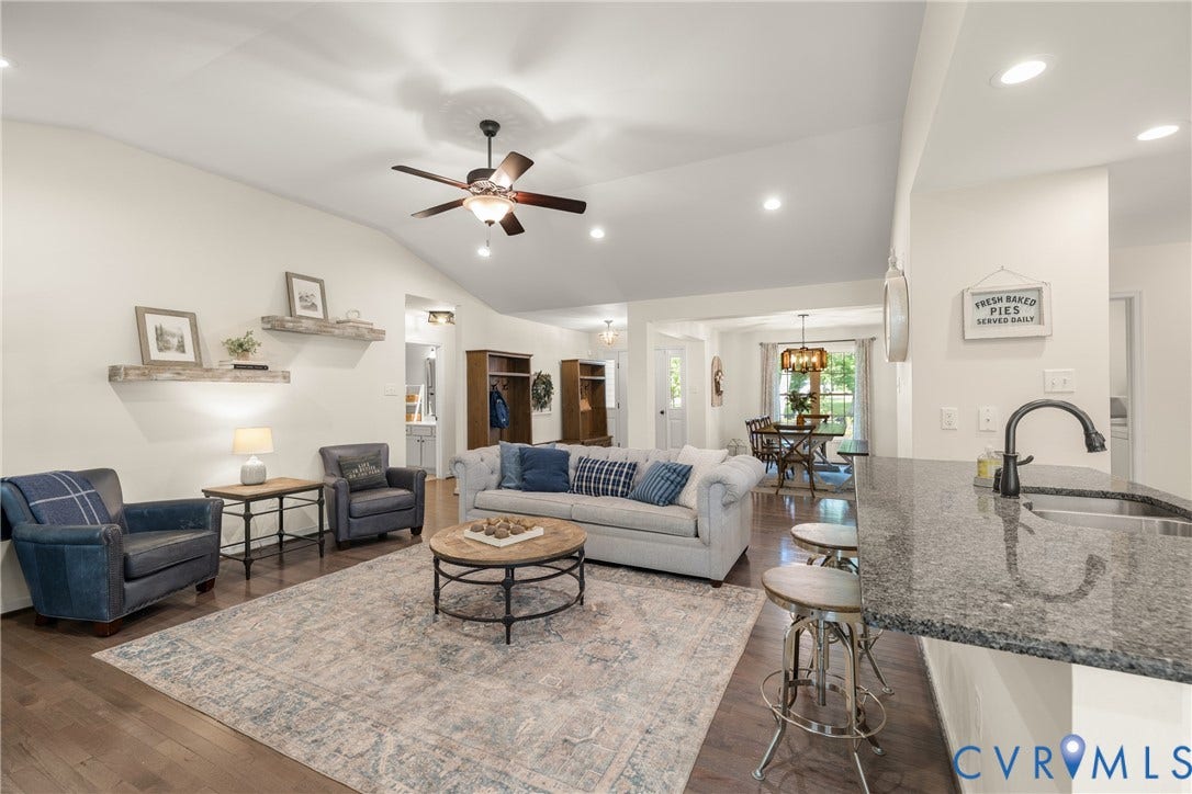 2803 Preston Park Way, Preston Park, Sandy Hook, VA 23153 Open and spacious famliy room with wood floors, gas fireplace, great views of the backyard, and open the the kitchen.