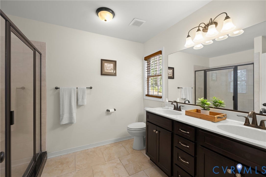 2803 Preston Park Way, Preston Park, Sandy Hook, VA 23153 Primary Bath with double vanity, walk in shower and tiled flooring.