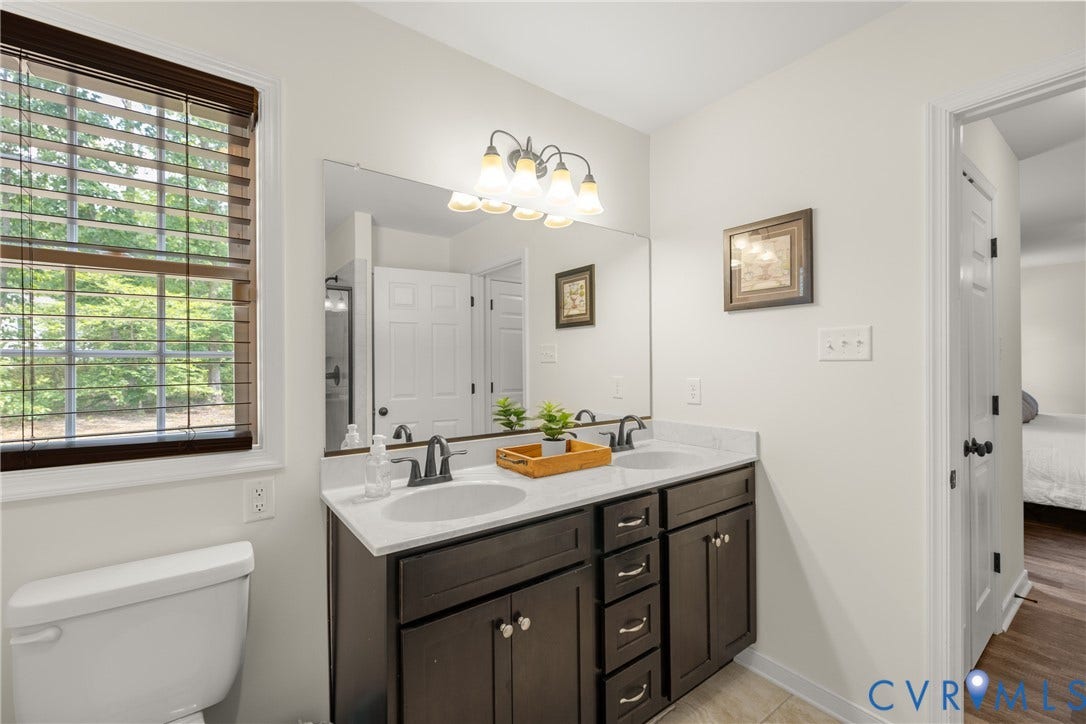 2803 Preston Park Way, Preston Park, Sandy Hook, VA 23153 Primary Bath with double vanity, walk in shower and tiled flooring.