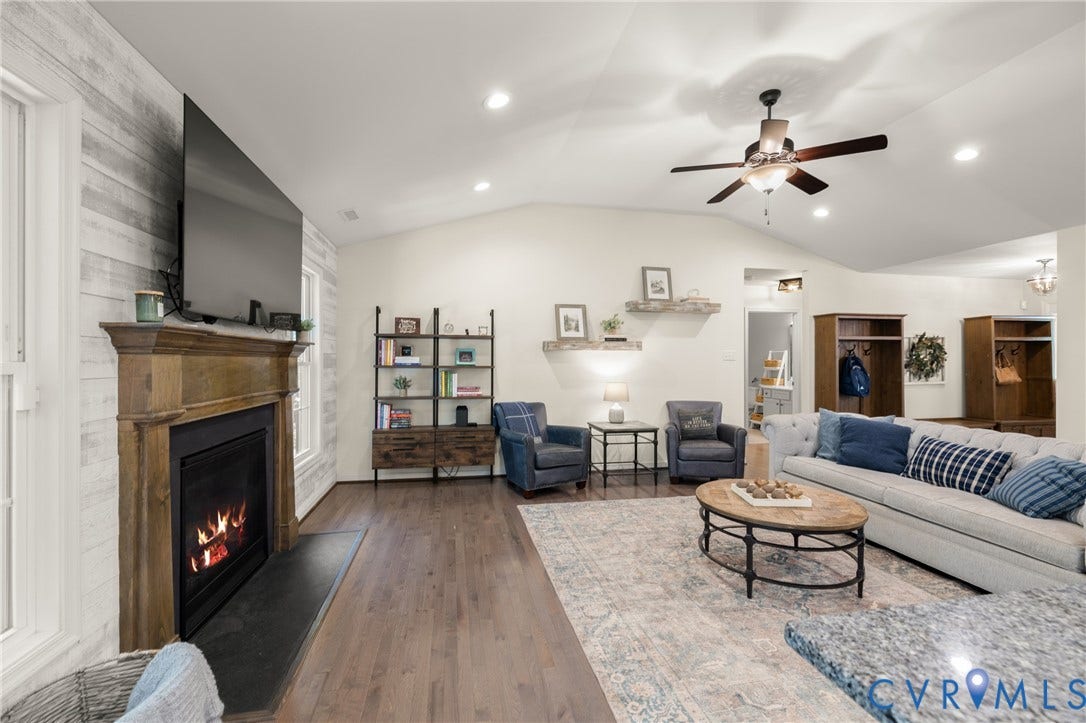 2803 Preston Park Way, Preston Park, Sandy Hook, VA 23153 Open and spacious famliy room with wood floors, gas fireplace, great views of the backyard, and open the the kitchen.