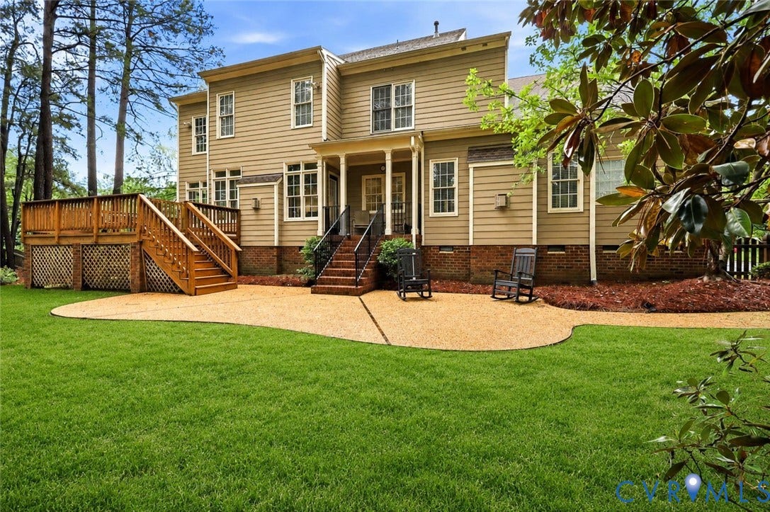 4701 Regal Oaks Road, Glen Allen, VA 23059 Enhanced photo of the grass. There is a newly encapsulated crawl space too