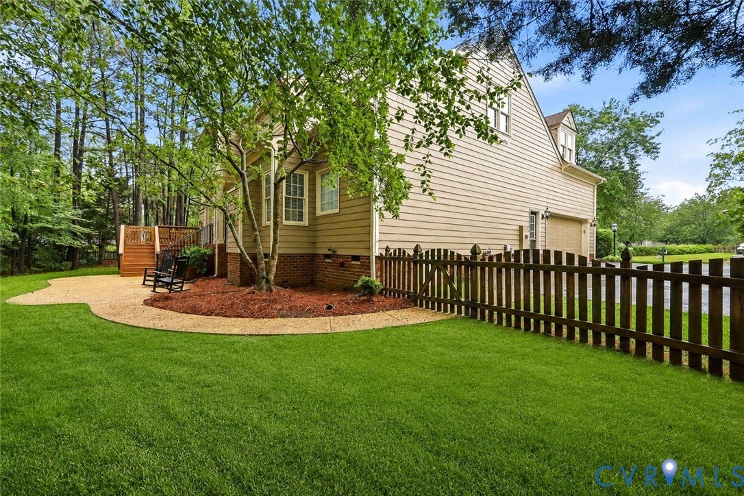 4701 Regal Oaks Road, Glen Allen, VA 23059 Enhanced photo of the grass but notice the fenced in space
